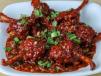 Chicken Lollipop Tossed In Schezwan Sauce