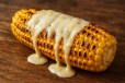 grilled sweet corn with cheese and lemon and spicy chilli