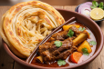 Porota With Mutton Stew