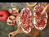 Toasted bread with labneh and pomegranate