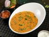 Vaghareli Khichdi (amul Ghee) served with Dahi and Fryums