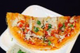 Schezwan Dosa With Cheese