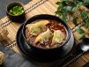 Hot And Sour Chicken Momo Soup