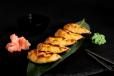 Mussel Baked Under Cheese Sauce