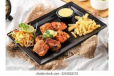 Fish Tikka 8Pcs   With French Fries , Souce And Salad