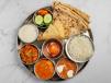Rajasthani Special Thali With Traditional Curry