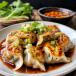 Steamed Wontons In Soya Garlic Sauce ( 8 Pieces)