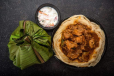 Wheat porotta boneless chicken kizhi