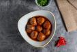 Vegetable Dumplings In Manchurian Sauce (V)