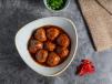 Vegetable Dumplings In Manchurian Sauce