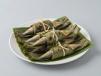 Grilled Anchovies wrapped in banana leaves
