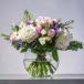 Elegant Centerpiece Flower Arrangement In Fish Bowl