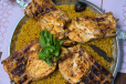 Kabsa tray with two charcoal grilled chicken
