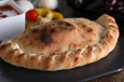 Calzone Prosciutto Funghi Pizza