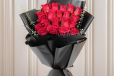Red Roses in Black Wrapping
