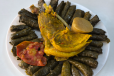 Half a rib with grape leaves