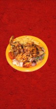 Half chicken on charcoal