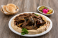 Beef shawarma plate with hummus