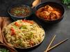 Hakka Noodles With Schezwan Veg Dumplings