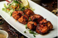 Boneless Tikka with Khubus and Hummus