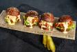 4 Sliders Buffalo Fried Chicken Tennessee Burgers topped w/melted cheese and Buffalo Sauce on a mini Keto Brioche Buns