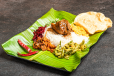 Rice And Curry In Banana Leaf