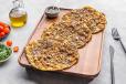 Mini Lahmacun with walnut and Pomegranate syrup