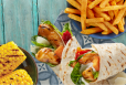Chicken Caesar Wrap + 2 regular sides