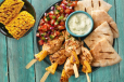 Chicken and Pineapple Skewers, Pita and Fresh Salsa + 1 regular side