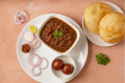Pindi Cholley with 2 Bhaturas + Gulab Jamoun