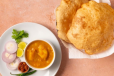 Rassedar Aloo with 2 Poories