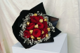 Red rose bouquet with chocolate