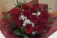 red bouquet with red wrapping