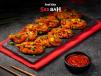 Schezwan Veg Momos