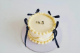 WHITE COQUETTE BOW CAKE