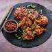 Spicy Veg Momos-(Choose Your Sauce)