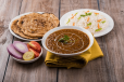 Lachha Paratha With Dal Makhni And Coke