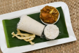 Puttu With Chicken Curry