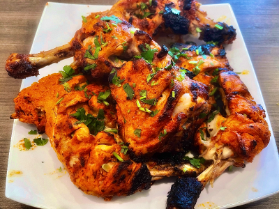 
                                Bombay Grills & Woks Restaurant