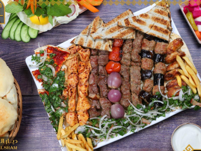 1 kilo mix grill served with hommos , veg and fries - Picture of Shams Al  Sham Restaurant, Ajman - Tripadvisor